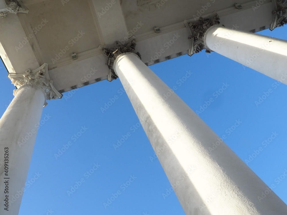 The columns of Helsinki Cathedral (Corinthian columns), against blue sky (Helsinki, Finland) The columns of Helsinki Cathedral (Corinthian columns), against blue sky (Helsinki, Finland)