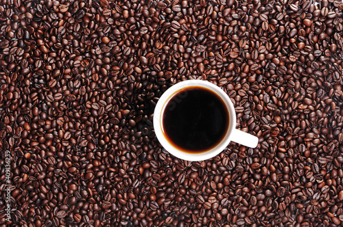 Coffee beans and coffee cup