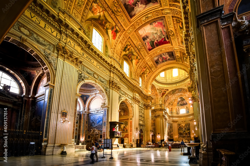 The ornate, baroque interior of the Basilica of Sant'Andrea della Valle in the historic center of Rome, Italy