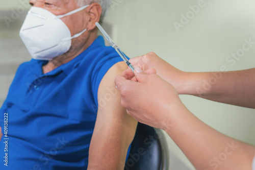 Sample of vaccine application to an older person
