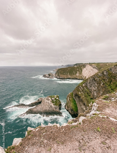 Vertical shot ofof Cabo de Penas, Asturias, Spain photo