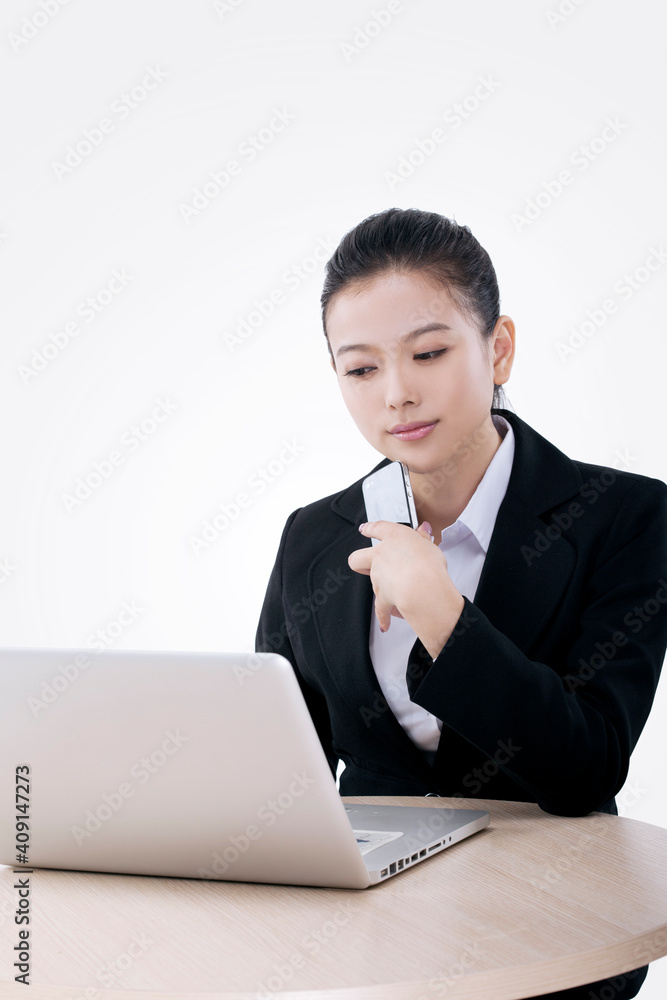 Oriental fashion business woman using computer Oriental fashion business woman using computer
