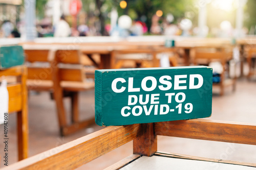 The restaurant sign tells customers that the store is closed because of coronavirus (COVID-19).