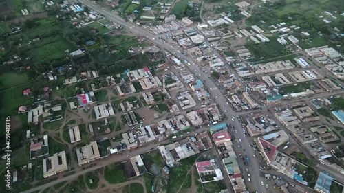 Drone shot over Kimana, Kenya. Showing the busy streets and rooftops of the small town. photo