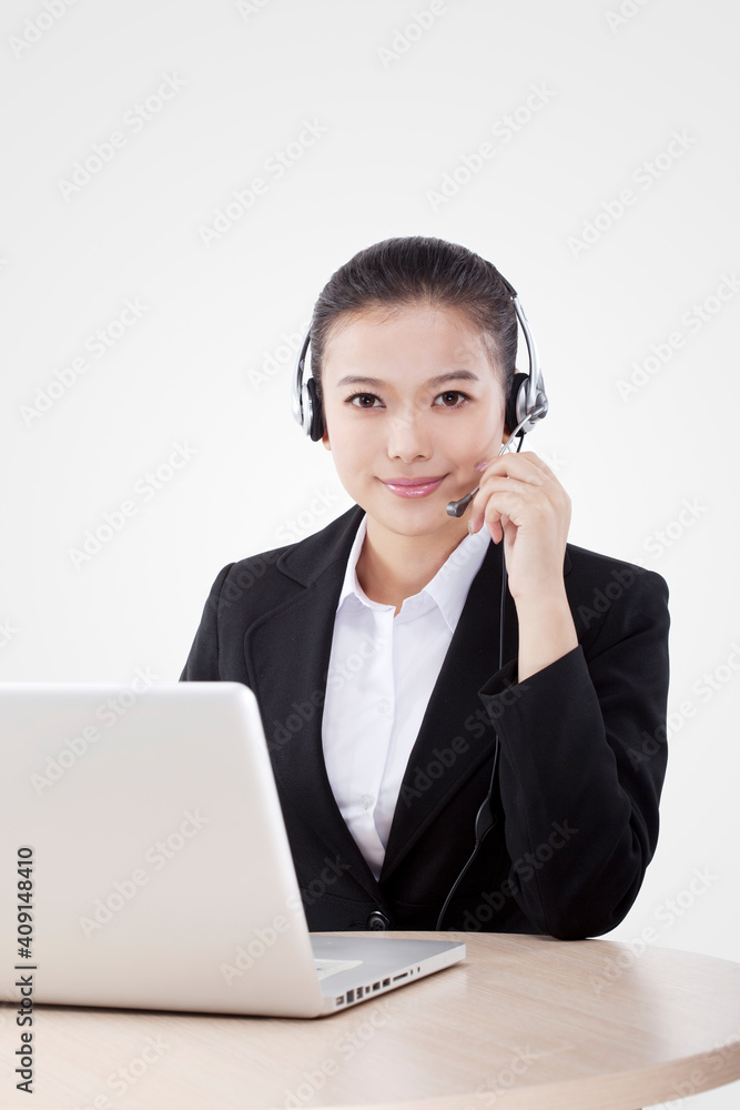 Oriental fashion business woman using computer Oriental fashion business woman using computer