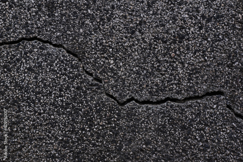 Wallpaper Mural Dark texture of old broken asphalt road or wall big abrasions cracks on the surface pebbles cement in Sofia, Bulgaria, Eastern Europe Torontodigital.ca