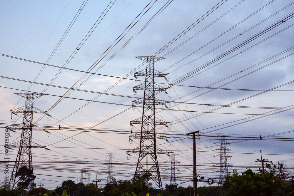 Electricity pole with dark sky before sunrise, Transmission line of electricity to rural, electricity transmission pylon