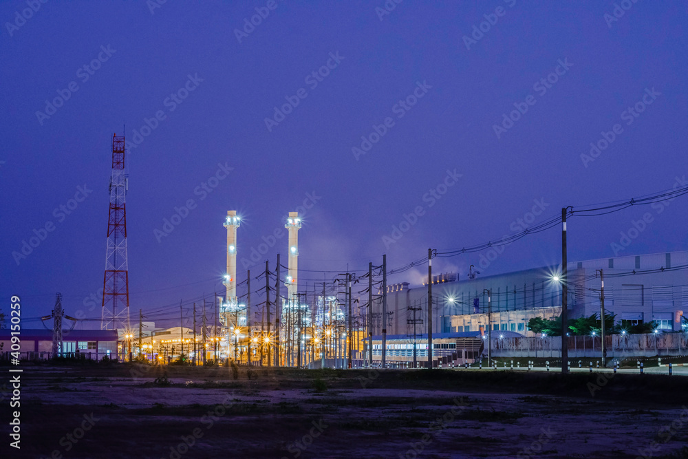 Night scene of oil refinery plant and storage factory, Industrial factory plant with beautiful light in dark night