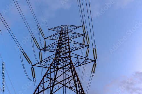 Electricity pole with dark sky before sunrise, Transmission line of electricity to rural, electricity transmission pylon