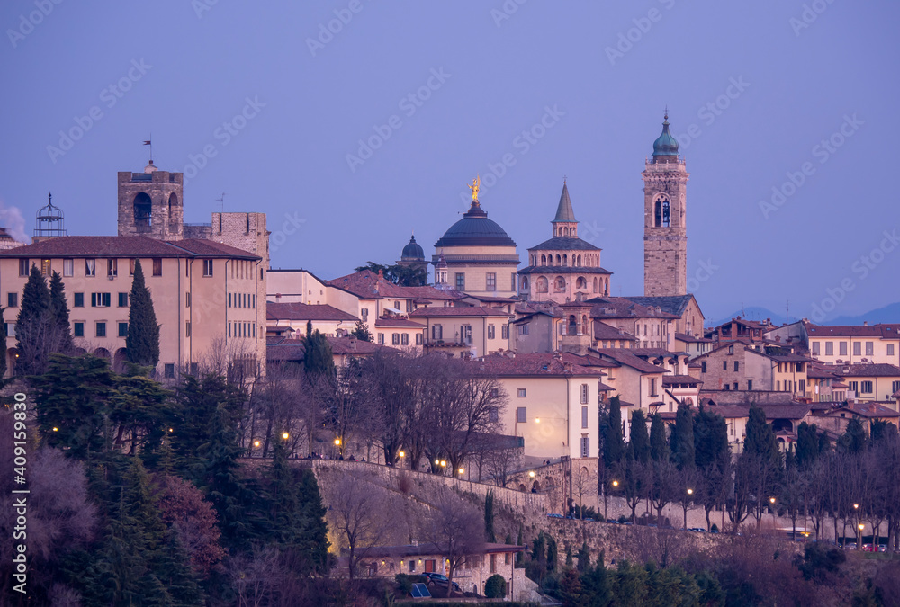 Bergamo. One of the beautiful city in Italy. Landscape at the old town from the hill during sunset. Amazing view of the towers, bell towers and main churches. Touristic destination. Best of Italy