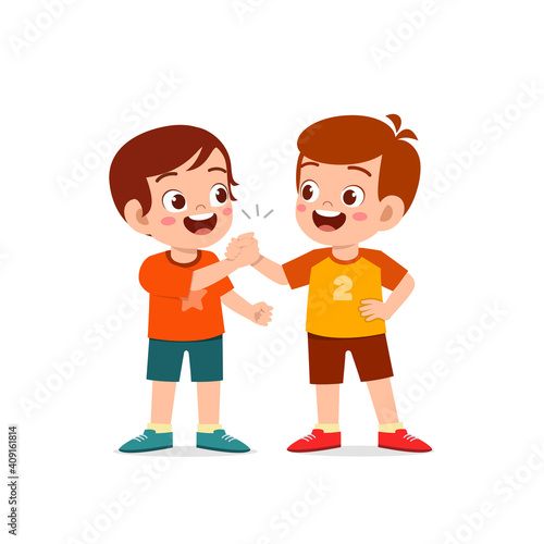 cute little kid boy holding hand with his friend