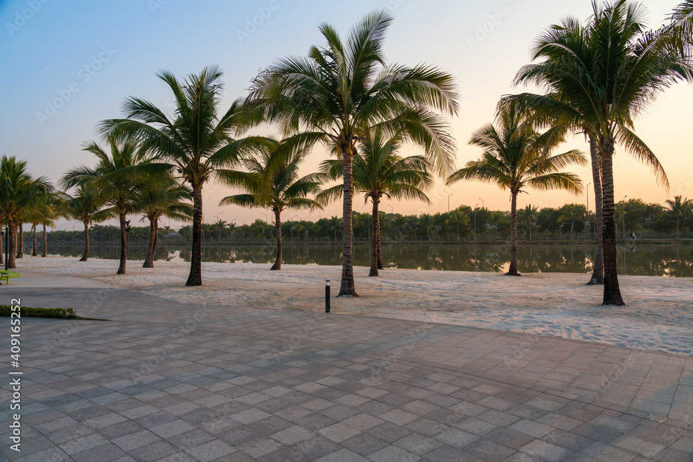 Fototapeta premium Emty sandbank along river with coconut trees