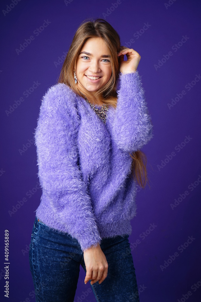 Portrait girl in violet background Portrait girl in violet background