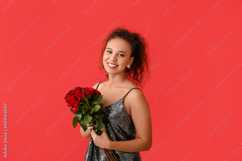 African-American woman with bouquet of beautiful flowers on color background African-American woman with bouquet of beautiful flowers on color background