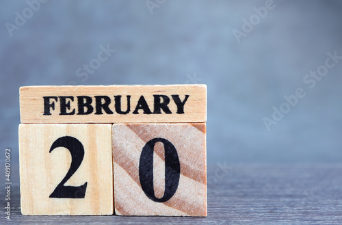 Day 20 of february month, Wooden calendar with date. Empty space for text.