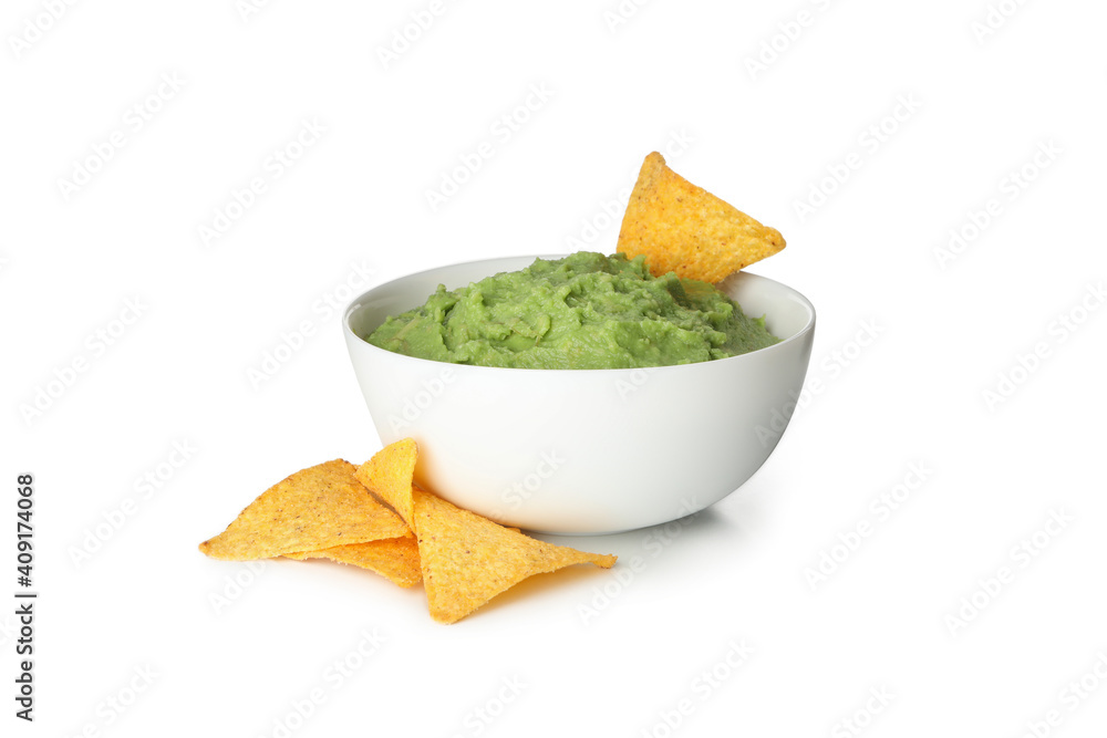 Bowl of guacamole and chips isolated on white background - obrazy, fototapety, plakaty 