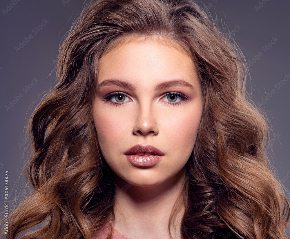 Beautiful brown-hair girl with long hair. Pretty caucasian girl with wavy hair. Beautiful brown-hair girl with long hair. Pretty caucasian girl with wavy hair.