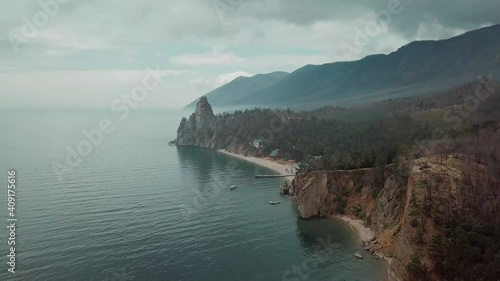 Drone video. Summer. Lake. The mountains. Sandy bay