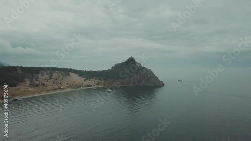 Drone video. Summer. Lake. The mountains. Sandy bay