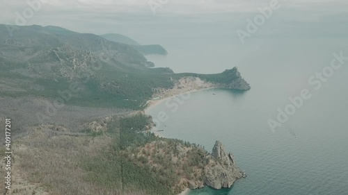 Drone video. Summer. Lake. The mountains. Sandy bay