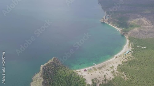 Drone video. Summer. Lake. The mountains. Sandy bay