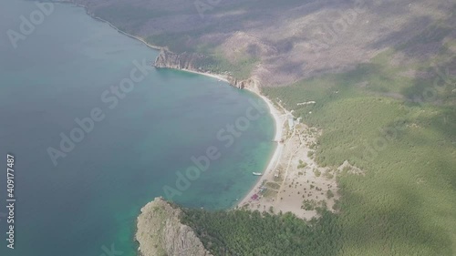 Drone video. Summer. Lake. The mountains. Sandy bay