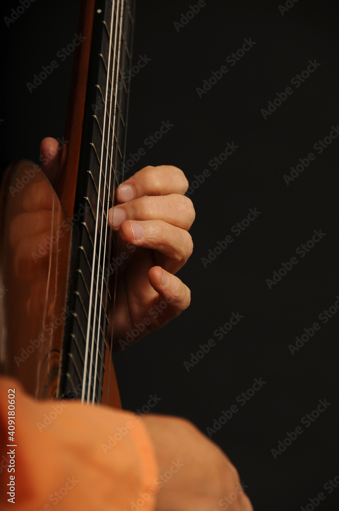 Close up of an acoustic guitar being played Close up of an acoustic guitar being played
