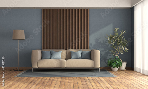 Fototapeta Naklejka Na Ścianę i Meble -  Living room with sofa against wooden panel