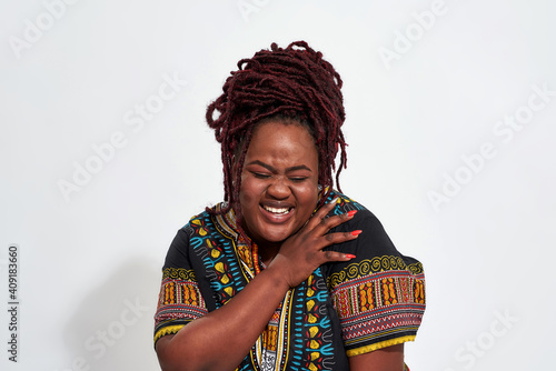 Schilderij op canvas Portrait of plump young haitian woman laughing out loud