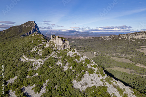 Ruins of the Castle of Montferrand on the mountain Pic St Loup, St-Mathieu-de-Treviers, Occitanie, France  photo