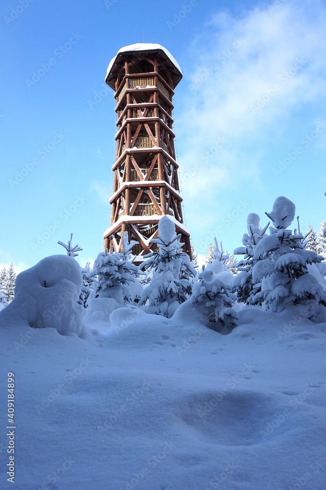 Winter landscape with snowy trees and watchtower Winter landscape with snowy trees and watchtower