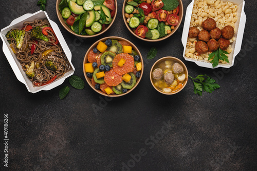 Cooked food in paper eco-friendly containers. Food delivery for home or office. Vegetable  fruit salads  soup  meat and side dishes