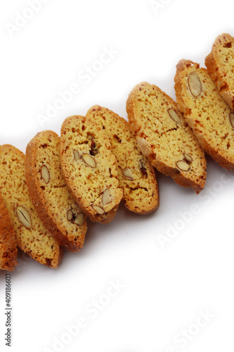 Traditional Italian Cantucci or Cantuccini cookies with almonds isolated on white background