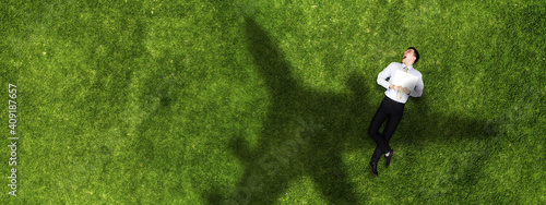 Airplane shadow on green field © Sergey Nivens