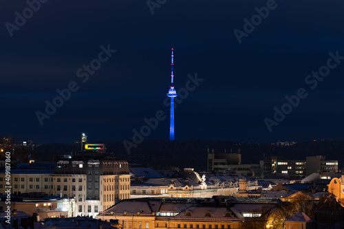 Vilnius city view with TV tower on background in winter with snow 