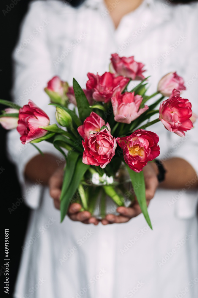 White peony tulips in a vase on the table White peony tulips in a vase on the table