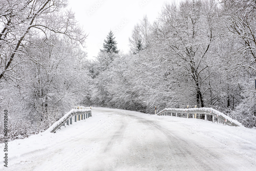 Naklejka premium snow covered road
