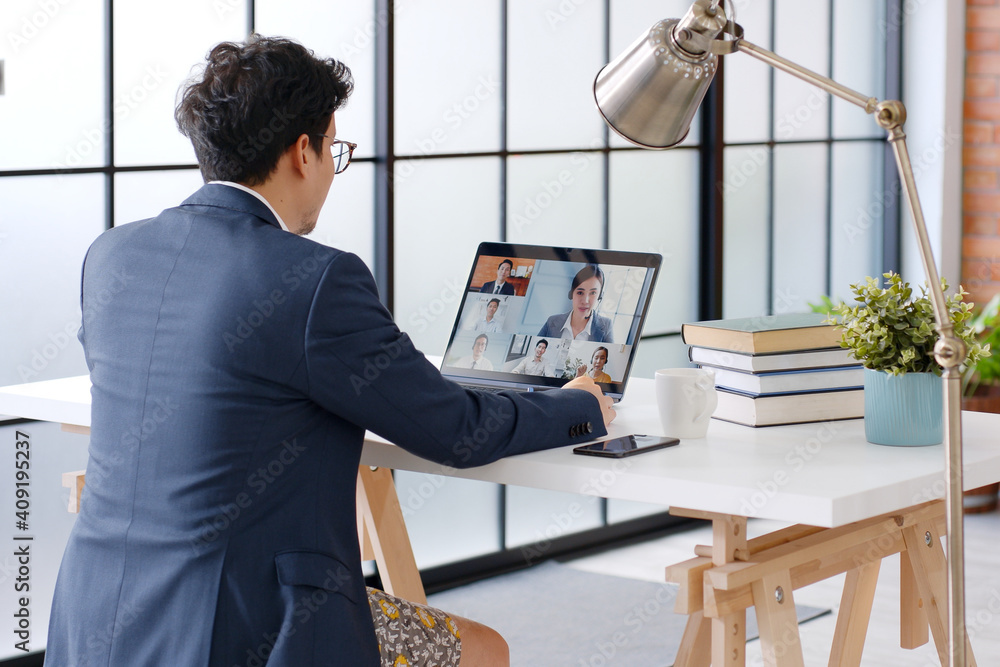 Young Asian funny businessman wearing underwear boxer work at home and  virtual video conference meeting with colleagues business people, online  working, video call at home office Stock Photo | Adobe Stock