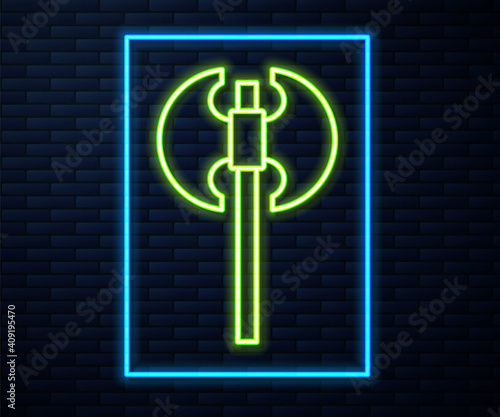 Glowing neon line Medieval axe icon isolated on brick wall background. Battle axe, executioner axe. Medieval weapon. Vector.
