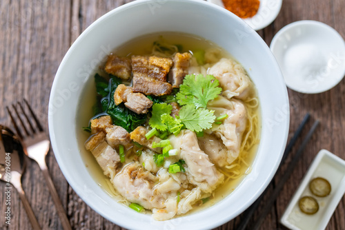 Wonton Noodles Soup with fish balls, Crispy pork, and special homemade Soup. Thai noodles soup.