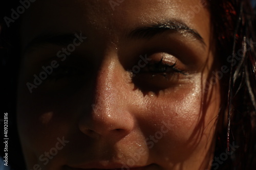 Wallpaper Mural Young woman in the sun portrait close up Torontodigital.ca