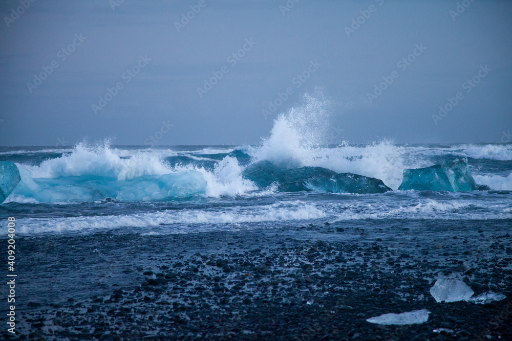 Naklejka premium Iceland, Diamond beach - January 4 2018 the famous beach in Iceland with ice looks like diamonds