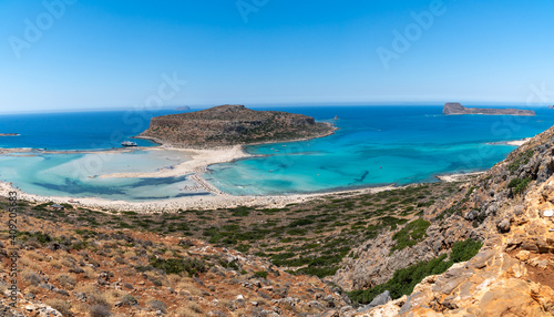 Panoramic view of Balos Lagoon near Chania, with magical turquoise waters, lagoons, tropical beaches of pure white, pink sand and Gramvousa island on Crete, Cap tigani , vivd colors. Greece