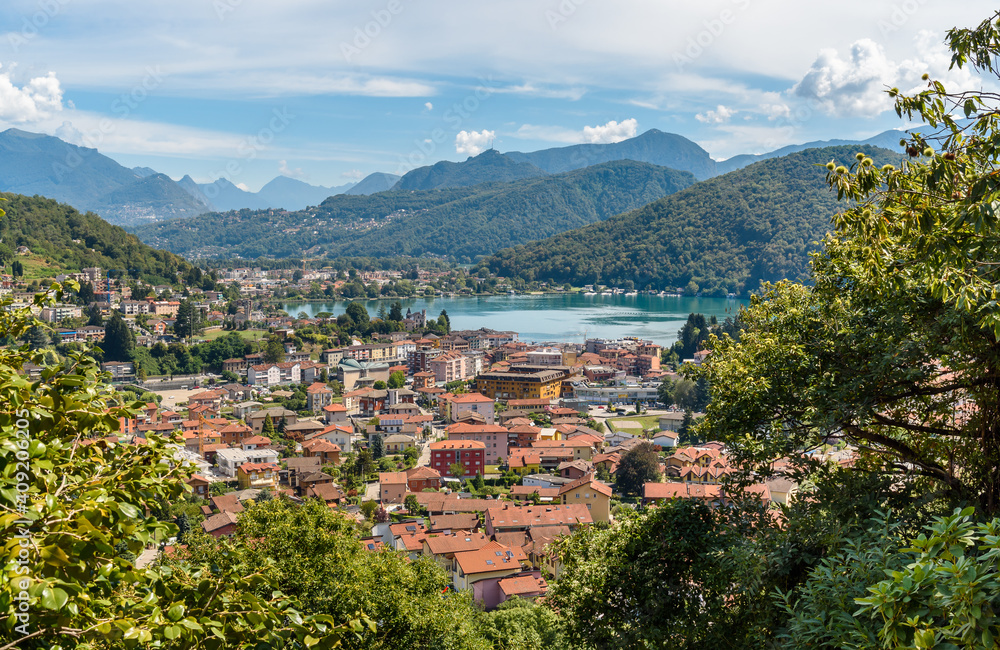 Landscape of lake Lugano and Lavena Ponte Tresa town from Cadegliano Viconago village , province of Varese, Italy