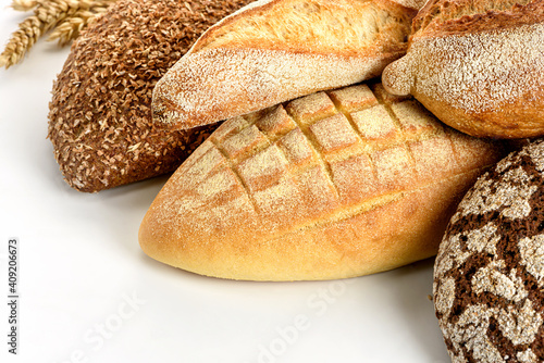 Different types of bread in on a white background.