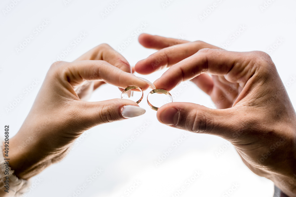 guy and a girl stretch out their hands to each other guy and a girl stretch out their hands to each other
