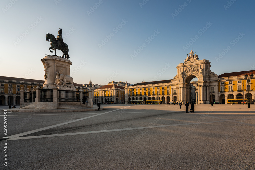 King Jose I Statue at Praca do Comercio in front of Triumphal Arch near waterfront. Old town of Lisboa in historic midtown Alfama district. Commerce square.
