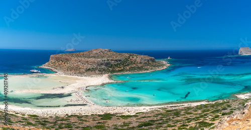 Amazing Panoramic view of Balos Lagoon near Chania, with magical turquoise waters, lagoons, tropical beaches of pure white, pink sand and Gramvousa island on Crete, Cap tigani, vivd colors. Greece