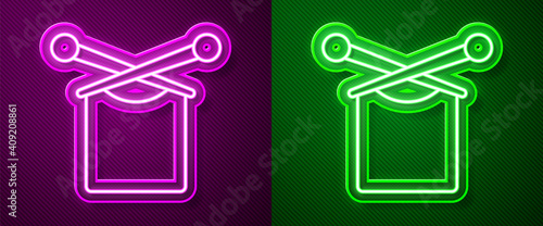 Glowing neon line Knitting icon isolated on purple and green background. Wool emblem with knitted fabric and needle. Label for hand made, knitting or tailor shop. Vector.