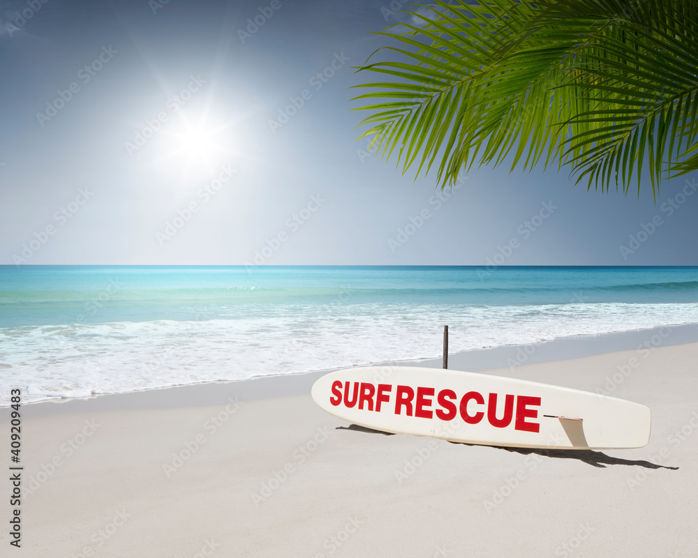 Obraz premium Close up view of rescue surf board on tropic beach background